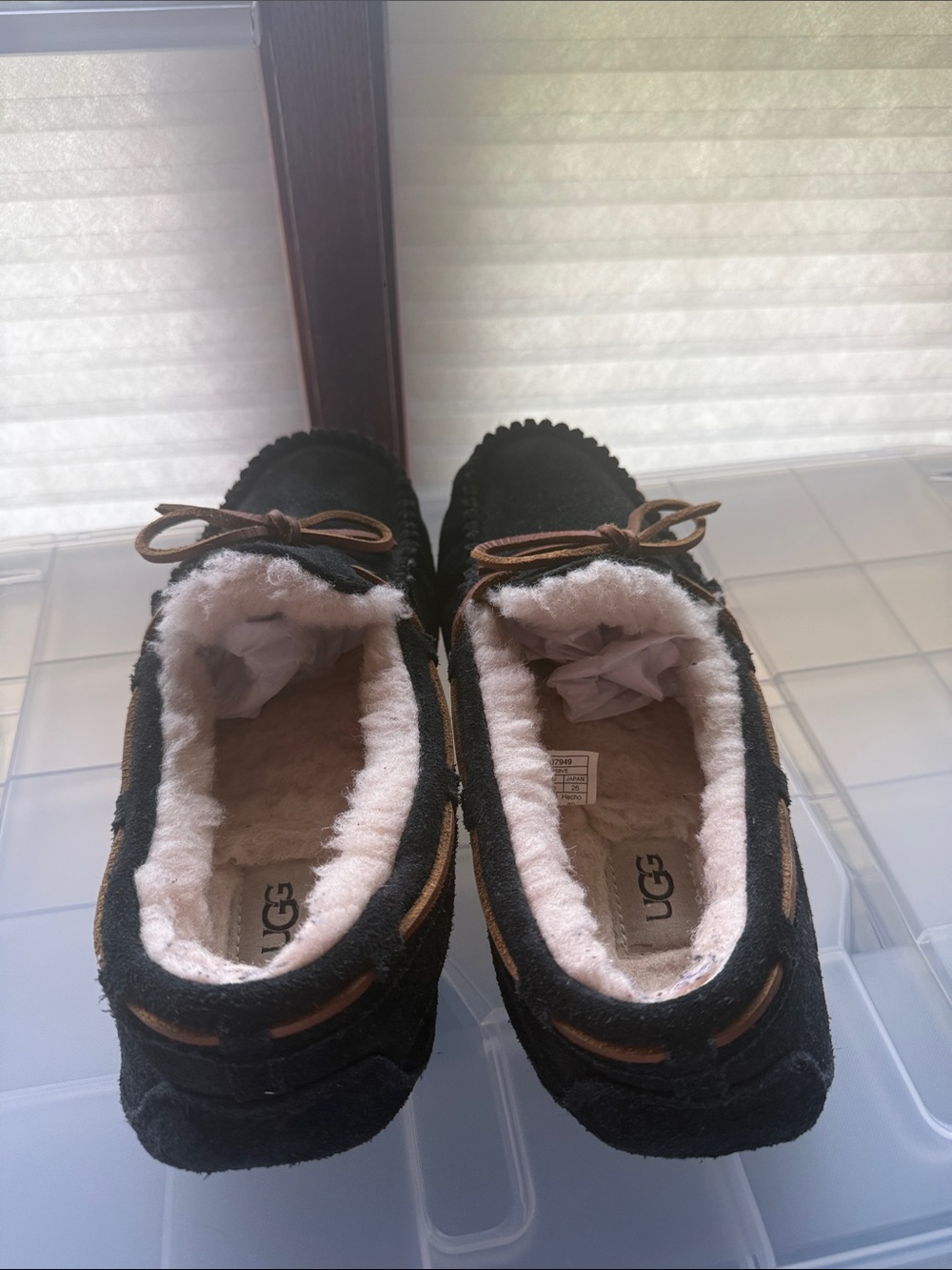 UGG black and tan slippers